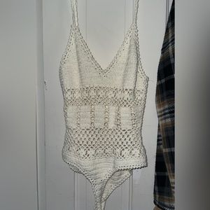 Knitted body suit
